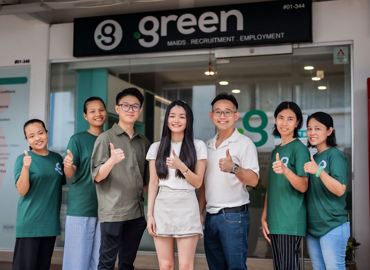 Green Employment team and visitors at maid agency office